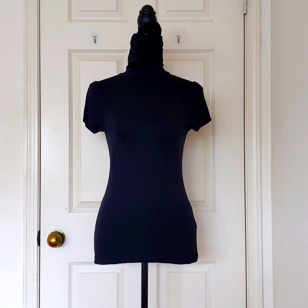 NWOT. The Limited Rayon and Spandex Black Short Sleeve Turtleneck Top.